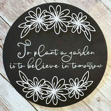 Load image into Gallery viewer, Black and white interchangeable insert with floral border and quote “To plant a garden is to believe in tomorrow” for seasonal home decor