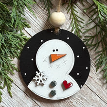 Load image into Gallery viewer, Charming hand-painted snowman ornament capturing playful holiday spirit and festive warmth.