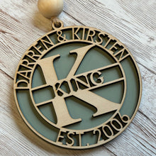 Load image into Gallery viewer, personalized ornament, couple ornament, monogram ornament, custom name ornament, wooden Christmas ornament, established year ornament, wedding gift, anniversary gift, newlywed gift, personalized couple gift, farmhouse Christmas décor, rustic-free farmhouse décor, Christmas keepsake, custom Christmas gift, Farmhouse Adjacent
