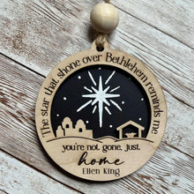 Load image into Gallery viewer, Decorative wooden ornament with star and nativity scene design on a wooden surface personalized memorial ornament
