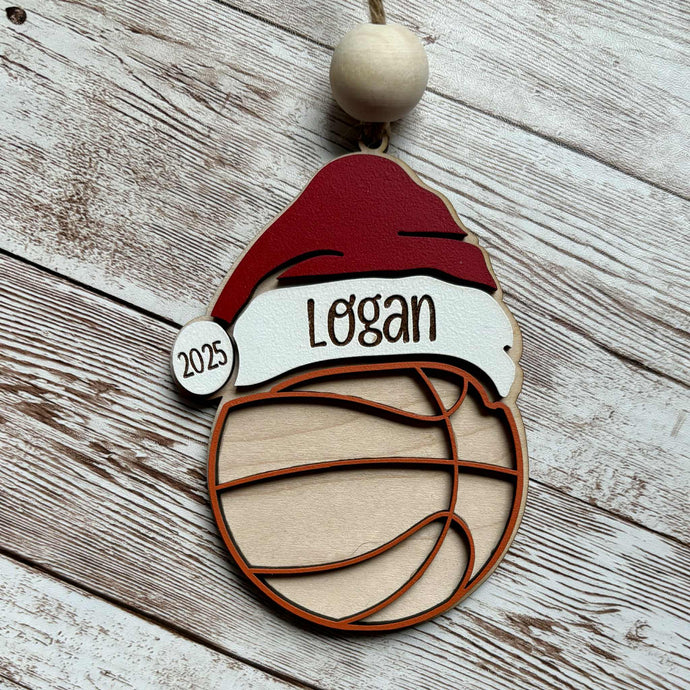 Basketball: Personalized basketball ornament with Santa hat and custom name, Christmas tree décor.

Baseball: Hand-painted baseball ornament with Santa hat and athlete name, holiday gift.

Soccer: Personalized soccer ornament with Santa hat and player name, festive Christmas ornament.

Volleyball: Volleyball ornament with Santa hat and custom name, handmade holiday décor.

Football: Personalized football ornament with Santa hat and athlete name, rustic Christmas ornament.