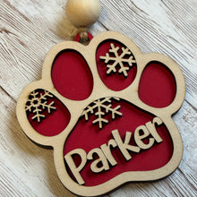 Load image into Gallery viewer, personalized dog ornament, dog paw ornament, dog Christmas ornament, custom pet ornament, personalized pet gift, dog name ornament, paw print Christmas ornament, dog lover gift, puppy Christmas ornament, pet keepsake, pet memorial gift, personalized Christmas gift, farmhouse Christmas décor,
